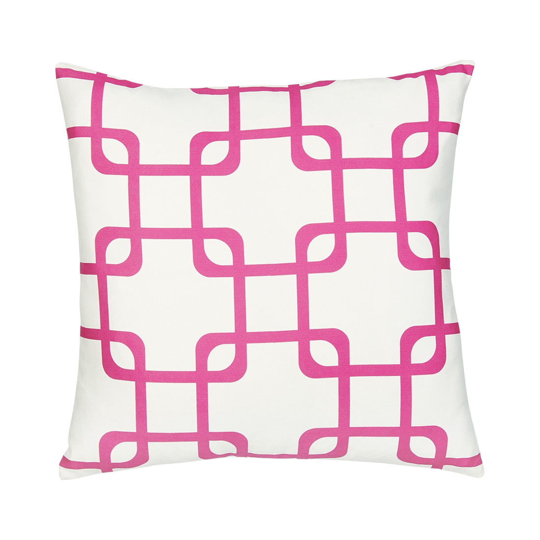 Decorative pillow with red geometric pattern on a brown chair against a dark wall.